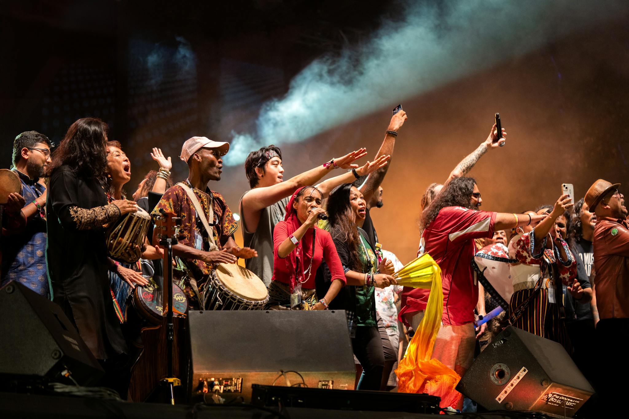 A lively group of musicians and diverse audience enjoying a concert.